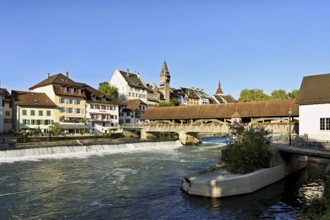 Old town with the tower of the Muri- Amthof, in the foreground the weir, the old wooden bridge over