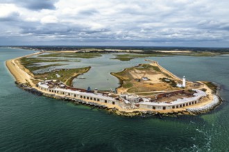 Hurst Point Lighthouse and Hurst Castle from drone over Hurst Spit, Milford on Sea, Lymington,