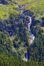 Waterfall cascading over rocks, near Zinal, Val d'Anniviers, Valais Alps, Canton Valais,