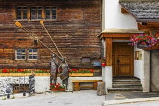 Copper sculptures of drummers and pipers, Saint Luc town house, Val d'Anniviers, Valais Alps,