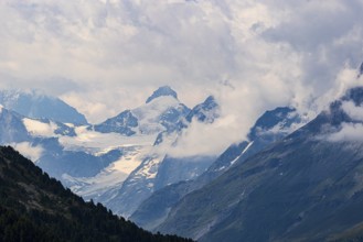 Four-thousand metre mountains and glaciers in clouds, above Zinal, Val d'Anniviers, Valais Alps,