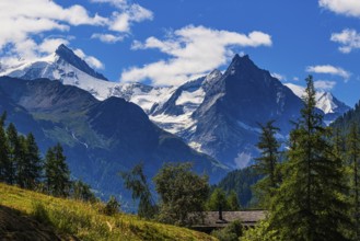 The Zinalrothorn and Besso mountains with their twin peaks, view from Ayer, Val d'Anniviers, Valais