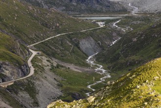 A pass road leads to the Moiry glacial lake, above Grimentz, Val d'Anniviers, Valais Alps, Canton