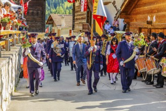 Drummers' and pipers' meeting in Mission, here the Echo des Alpes brass band marching in, led by a