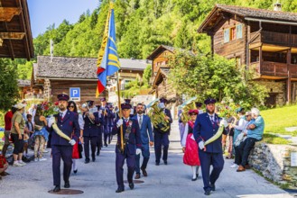 Drummers' and pipers' meeting in Mission, here the Echo des Alpes brass band marching in, led by a