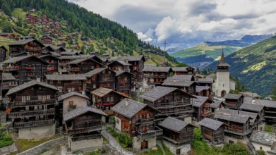 The historic centre of Grimentz with the church of Saint Theodule, drone image, Val d'Anniviers,