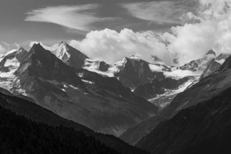The Besso mountains with twin peaks and the Obergabelhorn, black and white photograph, view from