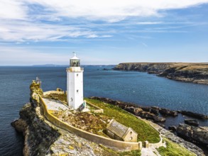 Godrevy Lighthouse from a drone, Godrevy Island, St Ives Bay, Cornwall, England, United Kingdom