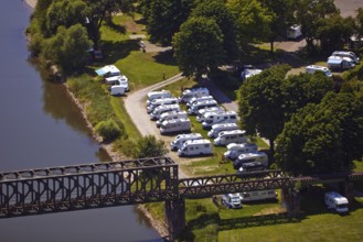 Elevated view from Eckberg to a motorhome parking area on the River Weser, Bodenwerder,