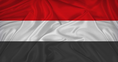 Flag of Yemen with cloth texture. Close up of Yemen flag waving