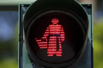 Traffic light man with Sebastian Kneipp, pedestrian traffic light with water doctor in the red
