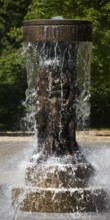 Fountain of Knowledge by Heinrich Jobst in the large spa gardens of Bad Nauheim, Hesse, Germany