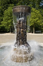 Fountain of Knowledge by Heinrich Jobst in the large spa gardens of Bad Nauheim, Hesse, Germany