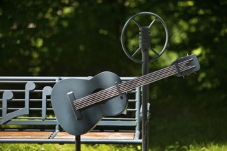 Elvis bench with guitar and microphone, Elvis Presley lived in Bad Nauheim, Hesse, Germany during