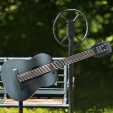 Elvis bench with guitar and microphone, Elvis Presley lived in Bad Nauheim, Hesse, Germany during