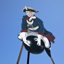 The ride on Münchhausen's cannonball, depicted in the Münchhausen town of Bodenwerder,