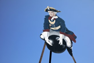 The ride on Münchhausen's cannonball, depicted in the Münchhausen town of Bodenwerder,