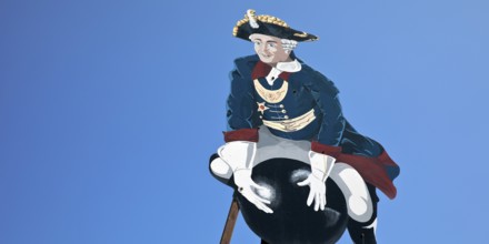 The ride on Münchhausen's cannonball, depicted in the Münchhausen town of Bodenwerder,