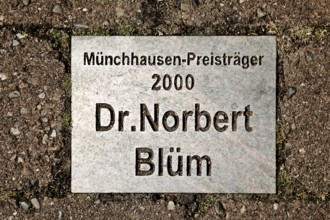 Sign for the Münchhausen Prize winner of 2000 Dr Norbert Blüm in the Münchhausen town of