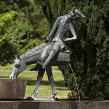 Münchhausen fountain by Bruno Schmitz with Münchhausen on the halved horse, Bodenwerder,