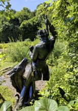 Statue of the swamp scene Pulling yourself out of the swamp by your own bootstraps in the
