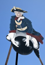The ride on Münchhausen's cannonball, depicted in the Münchhausen town of Bodenwerder,