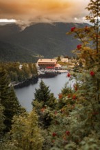 Romantic view of a lake surrounded by wooded mountains in the evening, Mummelsee, Seebach, Ortenau