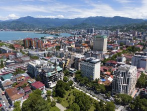 Panoramic view of a city with mountains and sea in the background, aerial view, Batumi, Black Sea,