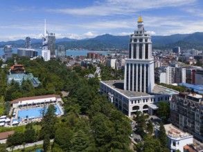 Cityscape with skyscrapers, park and sea near mountains, aerial view, on the right Hotel Sheraton,