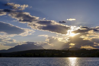 Sunset at the lake near Neuegg am Faaker See, behind Dobratsch, Carinthia, Austria