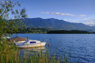Small boat in the lake near Neuegg am Faaker See, Carinthia, Austria