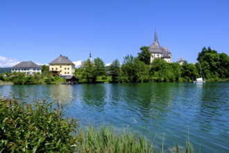 Maria Wörth pilgrimage church, on the southern shore of Lake Lake Wörth, Carinthia, Austria