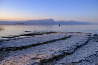 Sunset at Lido delle Grotte, Jamaica Beach, Sirmione on Lake Garda, Veneto, Veneto, Italy