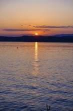 Sunset at Lido delle Grotte, Jamaica Beach, Sirmione on Lake Garda, Veneto, Veneto, Italy