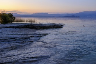Sunset at Lido delle Grotte, Jamaica Beach, Sirmione on Lake Garda, Veneto, Veneto, Italy