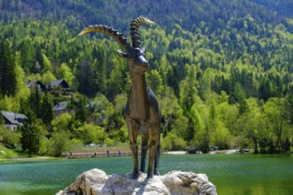 Ibex sculpture at Jasna Lake in Triglav National Park, Kranjska Gora, Upper Carniola, Julian Alps,