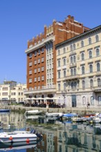 Commercial and residential buildings on the Grand Canal, Borgo Teresiano, Trieste, Adriatic Sea,