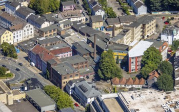 Aerial view, Haus der Gesundheit, former factory of the Berg company with chimney, now part of the