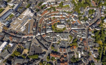 Aerial view, circular residential complex in the city centre with evang. Erlöserkirche,
