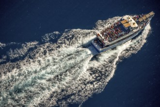 Excursion boat to Cap Norfeu, Cap de Creuers Cadaques, Mediterranean Bay of Roses, blue water,