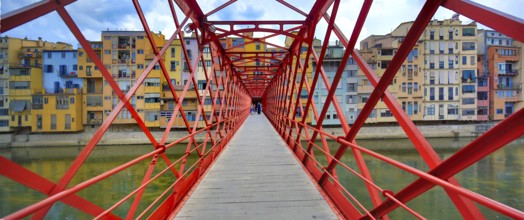 Red bridge over the river Onyar built by the Eiffel company, Cataluña, Gerona, Cataluña, Europe,