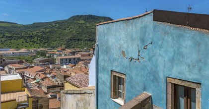 Sardinia, coloured house wall with crumbling plaster, Bosa, Europe, Province of Oristano, Italy,