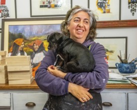 Sardinia, Pina Monne, portrait of woman and dog on arm, artist, Tinnura, Europe, province of