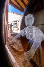 Sardinia, woman as grid model in the museum at work, Fordongianus, Europe, Province of Oristano,