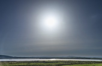 Sardinia, backlight sun over a lake and blue sky, Tharros, Europe, Province of Oristano, Italy,
