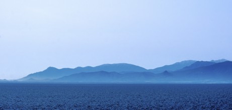 Sardinia, sea and mountains dipped in blue colour, Tharros, Europe, Province of Oristano, Italy,