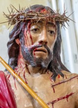 Sardinia, maltreated and bleeding face of Jesus with crown of thorns, Bosa, Europe, Province of