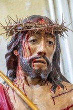 Sardinia, maltreated and bleeding face of Jesus with crown of thorns, Bosa, Europe, Province of
