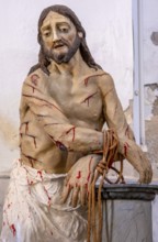 Sardinia, maltreated and bleeding Jesus figure, Bosa, Europe, Province of Oristano, Italy, worship,