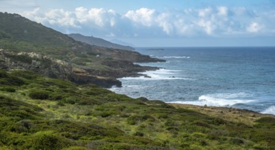 Sardinia, rugged coastal landscape by the sea, mountains, sea and more, blue sky with clouds,